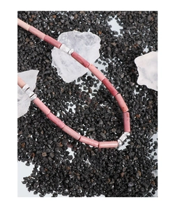Detailed close-up of S925 silver necklace with pink rhodochrosite stone beads