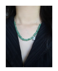Detail of S925 silver necklace featuring green aventurine beads and a drop pendant