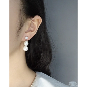 S925 silver stud earrings featuring triple vertical natural Baroque pearls on model