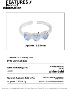 Detail showing S925 sterling silver ring with three heart-shaped blue moonstones