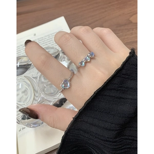 Elegant S925 silver moonstone heart rings set shown on hand with minimalist aesthetic