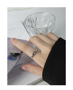 Macro detail of S925 sterling silver irregular ring with black oval onyx stone inlay