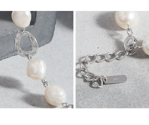 Macro shot of S925 sterling silver lobster clasp and baroque pearl bracelet texture