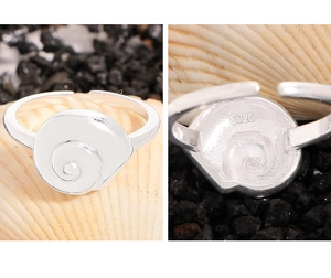 Detailed macro view of S925 sterling silver conch shell ring with silver hallmark
