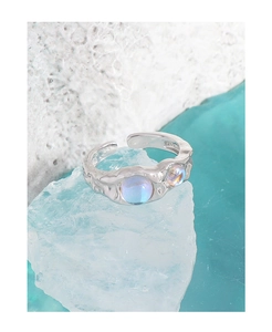 Macro shot of S925 silver ring with irregular texture and blue moonlight stones