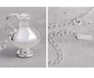 Detailed view of S925 sterling silver stamp on the bottle pendant sweater necklace