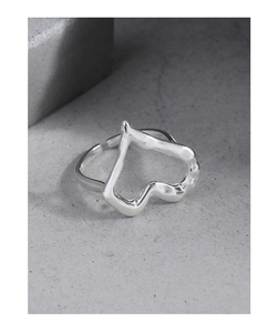 Macro shot of silver irregular heart ring with liquid metal texture and open adjustable band