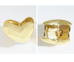 Macro view of S925 sterling silver heart earrings with hinge and polished gold finish