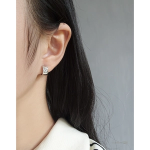 S925 sterling silver hoop earrings with heart-shaped zircon on a female model