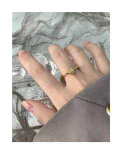 Detailed close-up of a gold-plated S925 silver ring featuring a cylinder inset with zircons