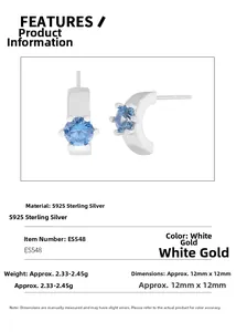Dettaglio di orecchini a cerchio quadrati in argento S925 con zircone blu e finitura oro