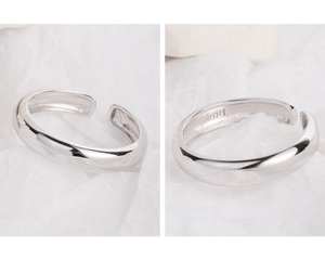 Macro detail of the S925 hallmark on the inner polished surface of the silver ring