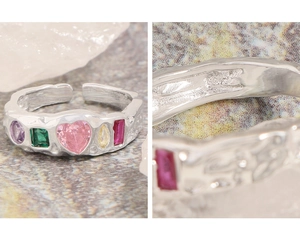 Detail view of S925 sterling silver ring with wrinkled texture and colorful zircons