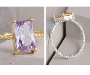 Macro detail of S925 sterling silver stamp on square-cut gem rings with twisted bands