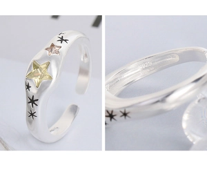Macro shot of S925 sterling silver hallmark and colorful star zircon settings on ring