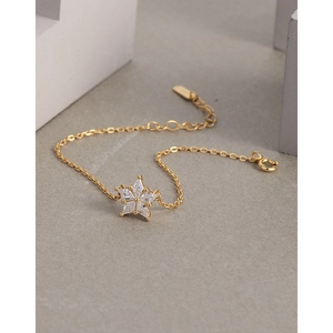 Minimalist gold S925 sterling silver bracelet with zircon snowflake charm on stone