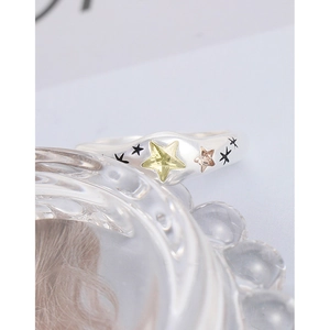 Minimalist S925 silver ring featuring yellow-green and pink star-shaped zircon stones