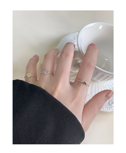 Close-up of S925 silver adjustable rings with colorful zircon in heart and oval shapes