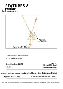 Macro detail showing S925 sterling silver double cross pendants with sparkling cubic zirconia
