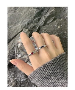 S925 silver ring set with micro-set heart and star zircon stones worn by a model