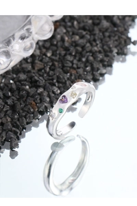 Macro shot of S925 silver open ring with colorful heart, star and round zircon stones