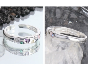 Macro shot of S925 sterling silver ring with colorful zircons and purity hallmark