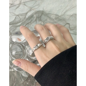 Modern S925 silver rings set with pearls and zircons in textured hammered metal design