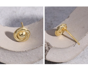 Detailed view of S925 sterling silver woven ball stud earrings with gold plating finish