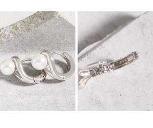 Vue macro du poinçon S925 sur des boucles d'oreilles en perles au design torsadé