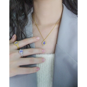 Elegant S925 silver twist ring and necklace set with purple zircon stones on model