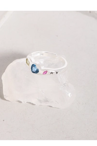 Macro shot of S925 silver adjustable ring featuring colorful heart and marquise zirconia