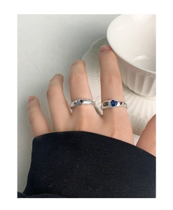 Detail view of S925 silver ring featuring blue heart-shaped zircon and geometric stones