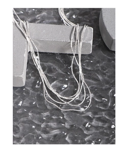 Detail of multi-strand S925 sterling silver layered necklace with minimalist metal chains