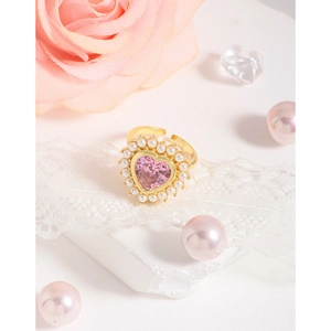 Bague réglable en argent S925 avec cœur en zircon rose et perles sur fond blanc