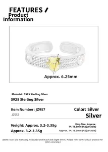 Detail of S925 silver ring featuring a heart-shaped yellow gemstone and pavé settings