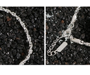 Détail de la chaîne torsadée en argent sterling S925 avec fermoir mousqueton et étiquette