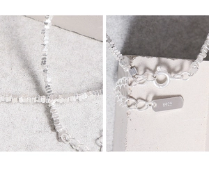 Detailed view of S925 sterling silver beaded bracelet with lobster clasp and extension chain