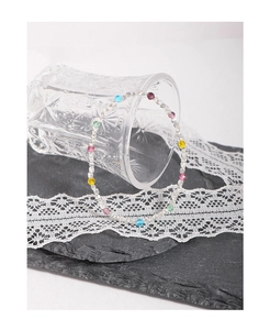 Close-up of S925 silver beaded bracelet with colorful multifaceted crystal accents