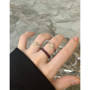 S925 sterling silver beaded rings with natural gemstones shown on model's hand