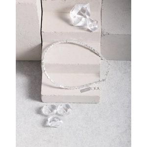Minimalist S925 sterling silver chain bracelet with faceted zircon beads on stone display