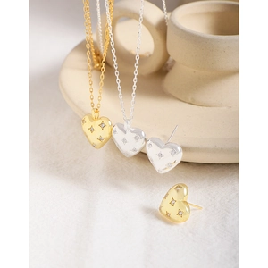 Polished S925 silver heart necklace and earring jewelry set with starburst zircon stones