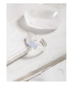 Macro detail of irregular wavy texture and blue agate stone on S925 silver ring