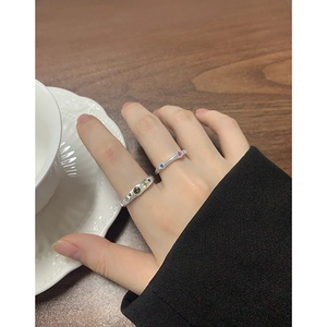 Handcrafted S925 silver ring set with colorful zircon stones on wave texture bands