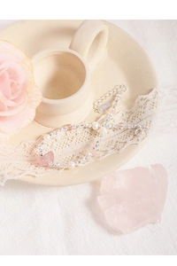 Detail of S925 silver beaded bracelet with irregular strawberry quartz and pearls