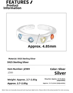 Close-up of S925 sterling silver wave ring with colorful zircon hearts and gems