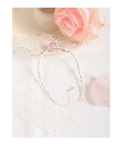 Detail view of S925 silver bracelet featuring pink heart strawberry crystal and white pearls