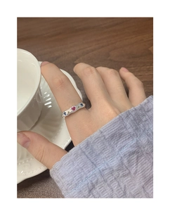 Detailed view of S925 silver ring featuring pink heart and blue star zircon stones