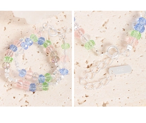 Close-up of S925 sterling silver clasp and colorful crystal beads on a delicate bracelet