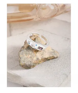 Close-up of S925 silver open ring featuring heart-shaped zircon and colorful gemstones