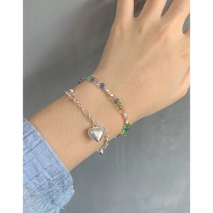 Dual-layer S925 silver bracelet featuring a heart pendant and multi-color crystal beads